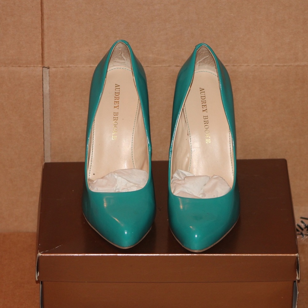 Teal blue pumps